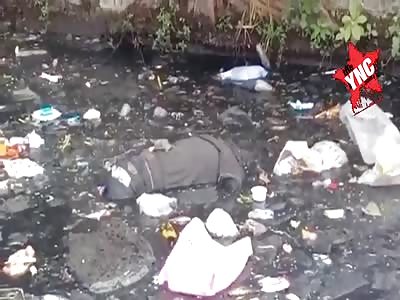 Lifeless body floating in the water.