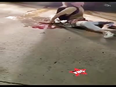 Motorcyclist dies under truck