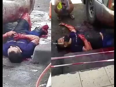 Man dying, after being hack with a machete