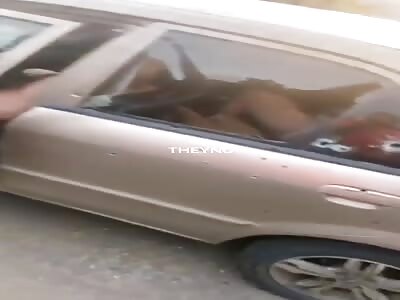 Shot to death inside their car