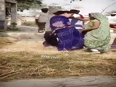 Women beaten with sticks