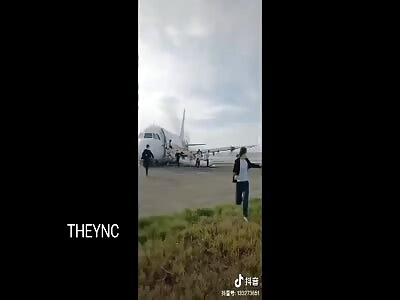 plane catches fire
