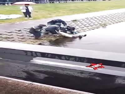 Dead woman pulled from the water