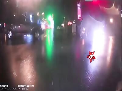 Biker ends up under the car