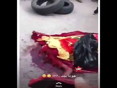 Man subdued by mob, after beheading his wife