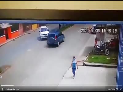 Biker gets dismounted by minibus then squashed by pick-up.