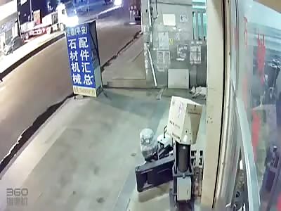 The girl drives a motorcycle and crashes with the truck