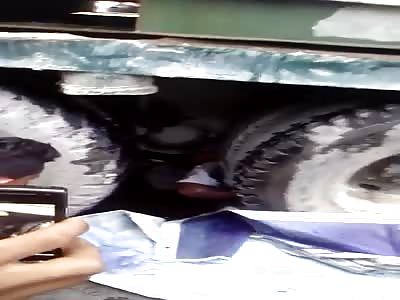 Man crushed between the rims of a truck