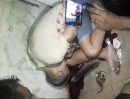 Bandit agonizing  after being shot in the head