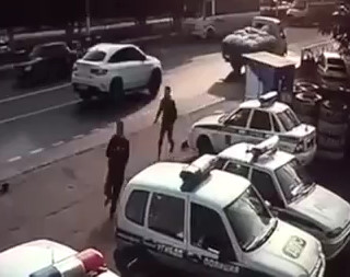 Police officer shoots man dead after he ploughed car into colleague and stabbed two others in frenzied attack