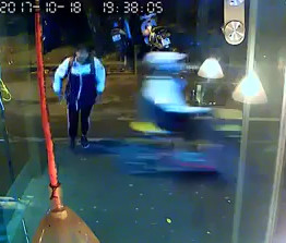 Girl distracted student breaks a window with his head 