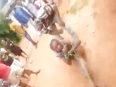 Naked Female Criminal Tied and Beaten Up in Africa