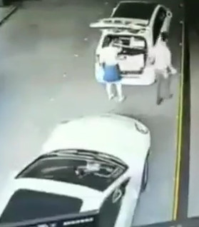  Woman Sandwiched Between Two Cars!