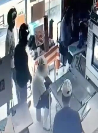 Two Men Shot Dead While Eating Dinner