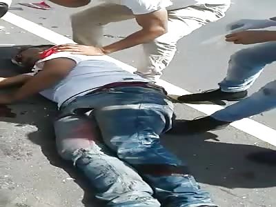 Guy dying after traffic accident.