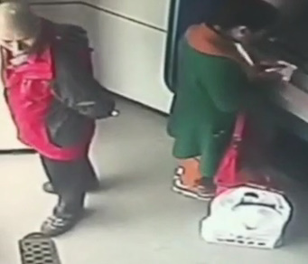 Asian Girl Slashed In ATM Room