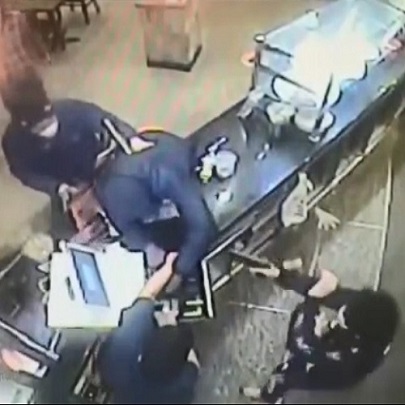 14-Year-Old Son of Pizza Shop Employee Shoots Robber In Face.