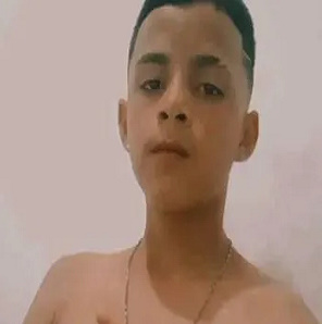 Cold Blooded Hitman Shoots 14Yo Boy In The Head Killing Him On Spot