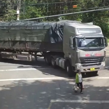 Elderly Woman Crushed to Death by Huge Trailer Truck