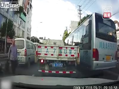 Two men on a scooter