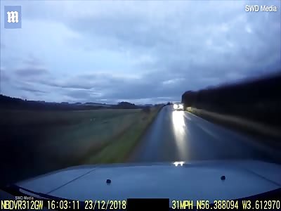 Head-on collision between van and family car