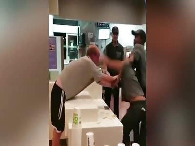 White man aggressively grabs black woman working at McDonalds