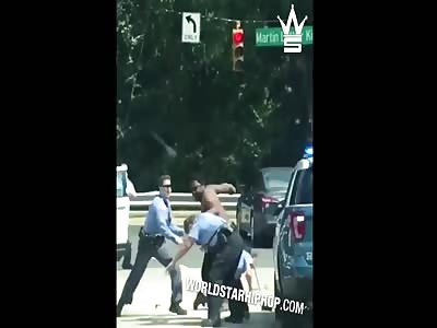 Dude Takes On A Bunch Of Cops & Gets Tased!