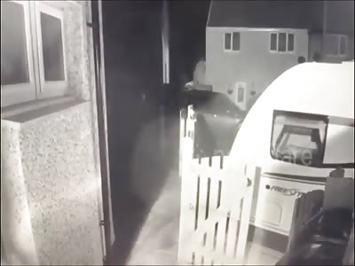 Masked gang member attacks dad outside own home with machete