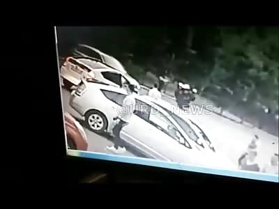 The motorcyclist flew into a parked car