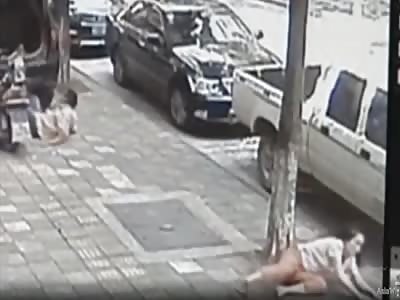 Husband runs over wife and hacks at her