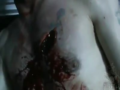 pierced man in agony