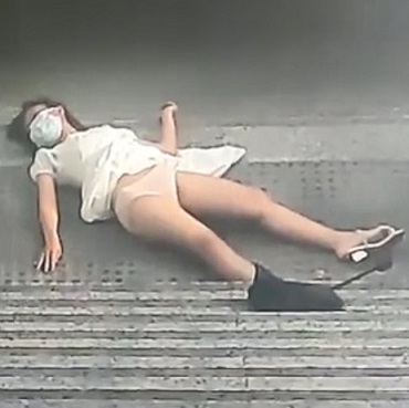 Woman Falls Down Subway Stairs Looking at Her Phone 