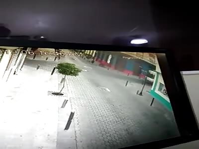 Biker Meets Bus at Intersection