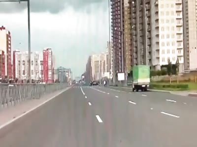 Speeding Biker Doesn't Notice Barrier Placed in Road