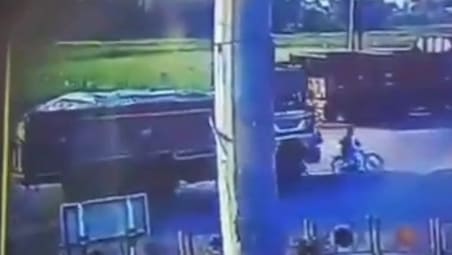 Man on Motorbike Flattened by Truck