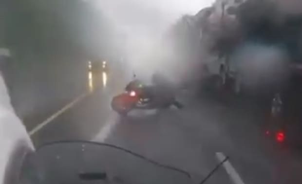 The Rain is Unforgiving For This Biker