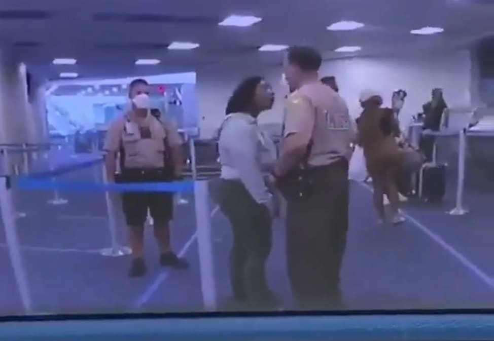 Unruly Woman Gets Bitch Slapped by Police Officer