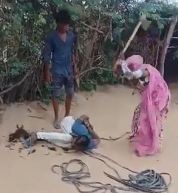 Indian Bitch Beats Tied Up Man w/ Axe