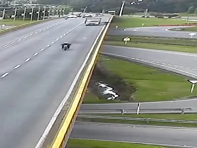 Cyclist Gets Knocked From Overpass