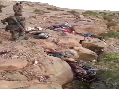 Civilians Executed and Thrown Down a Cliff