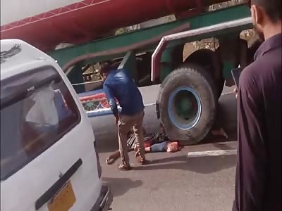 Split in Half Under Truck Wheels