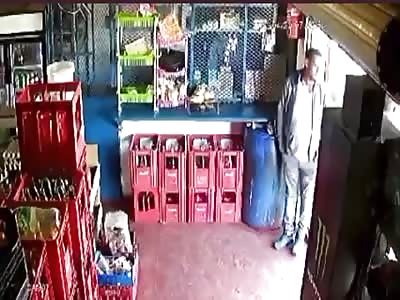 Store Owner Takes a Bullet to the Head