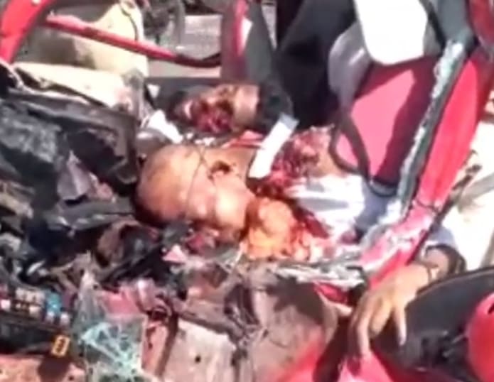 Driver and Passenger Pancaked By Two Trucks