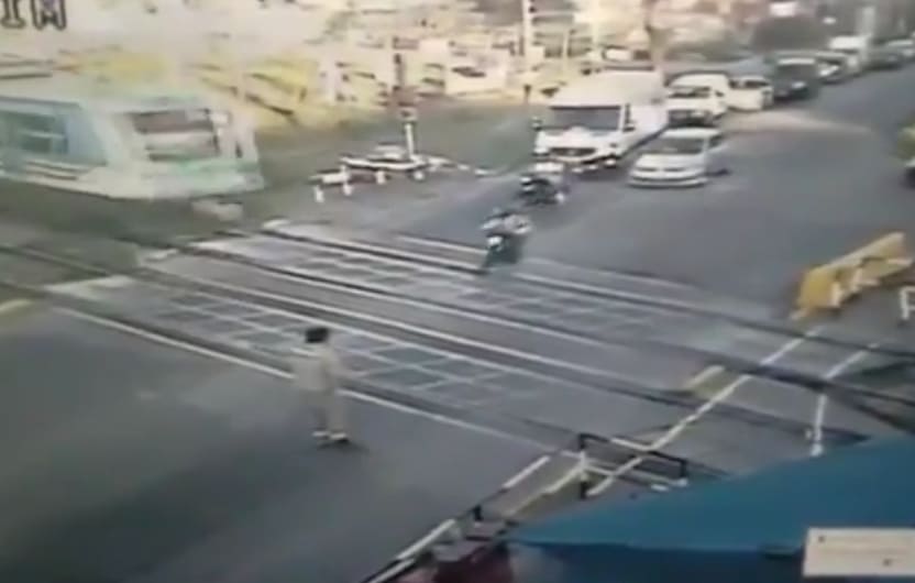 Biker Couldn't Beat The Train