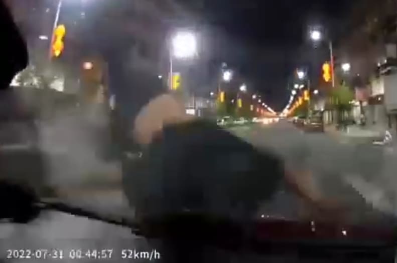 Oblivious Biker Meets Hood Of Car