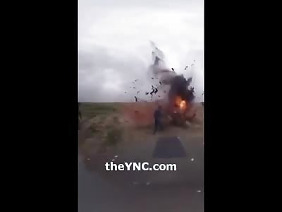 INJURED TERRORIST DETONATES HIMSELF (slow motion)