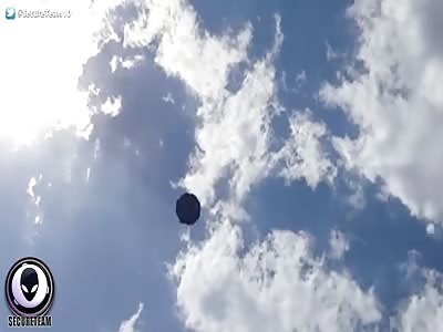 STRANGE Disc UFO Above Busy Mexico Roadway 