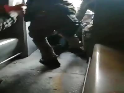 woman and restrained by police officers and creates a mess