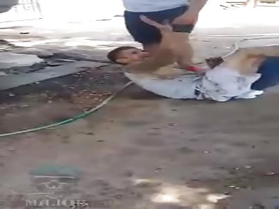 man being punished with mecanic key