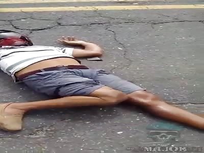 rugged biker on the street waiting for help